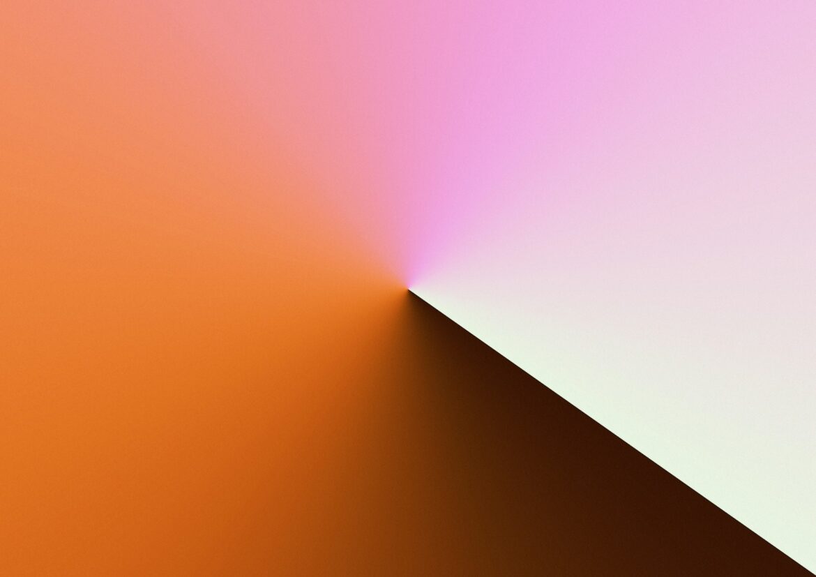 Diagonal gradient from orange to pink and white.