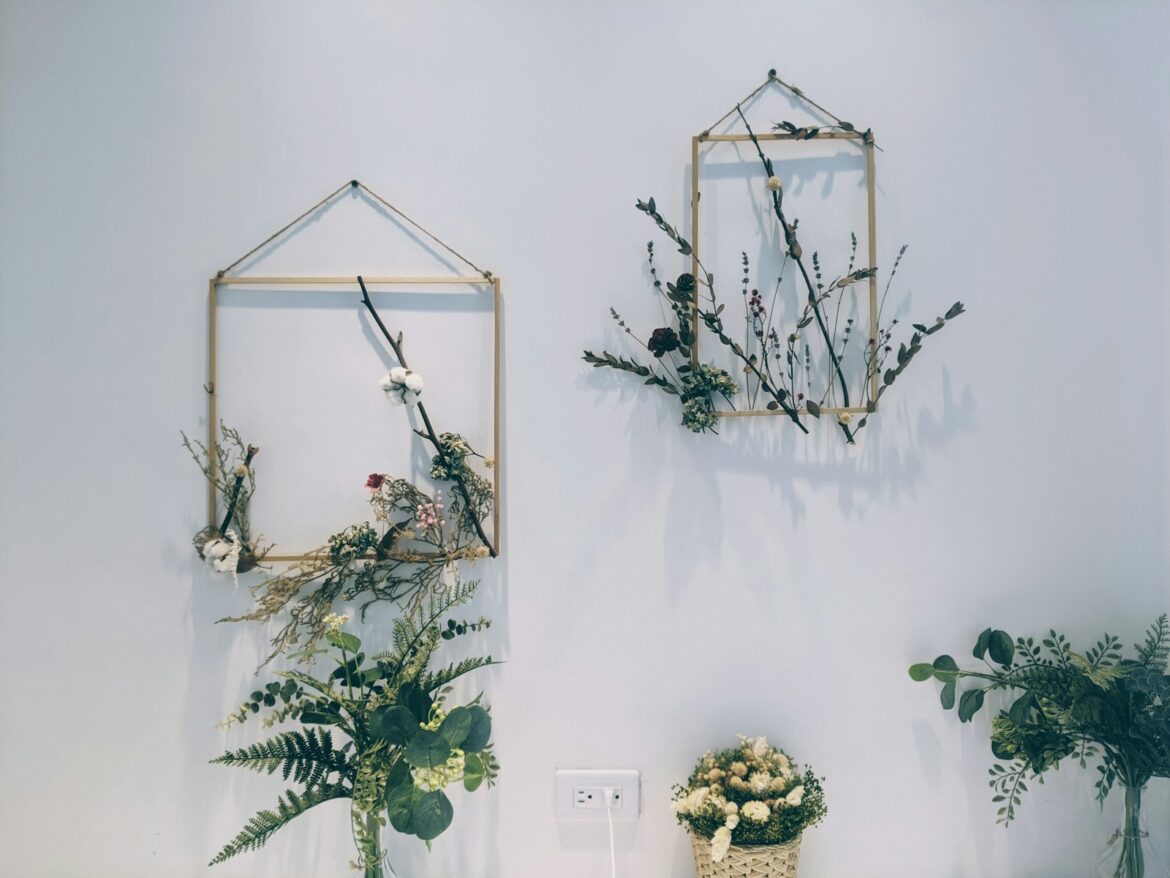 white flowers in clear glass vase